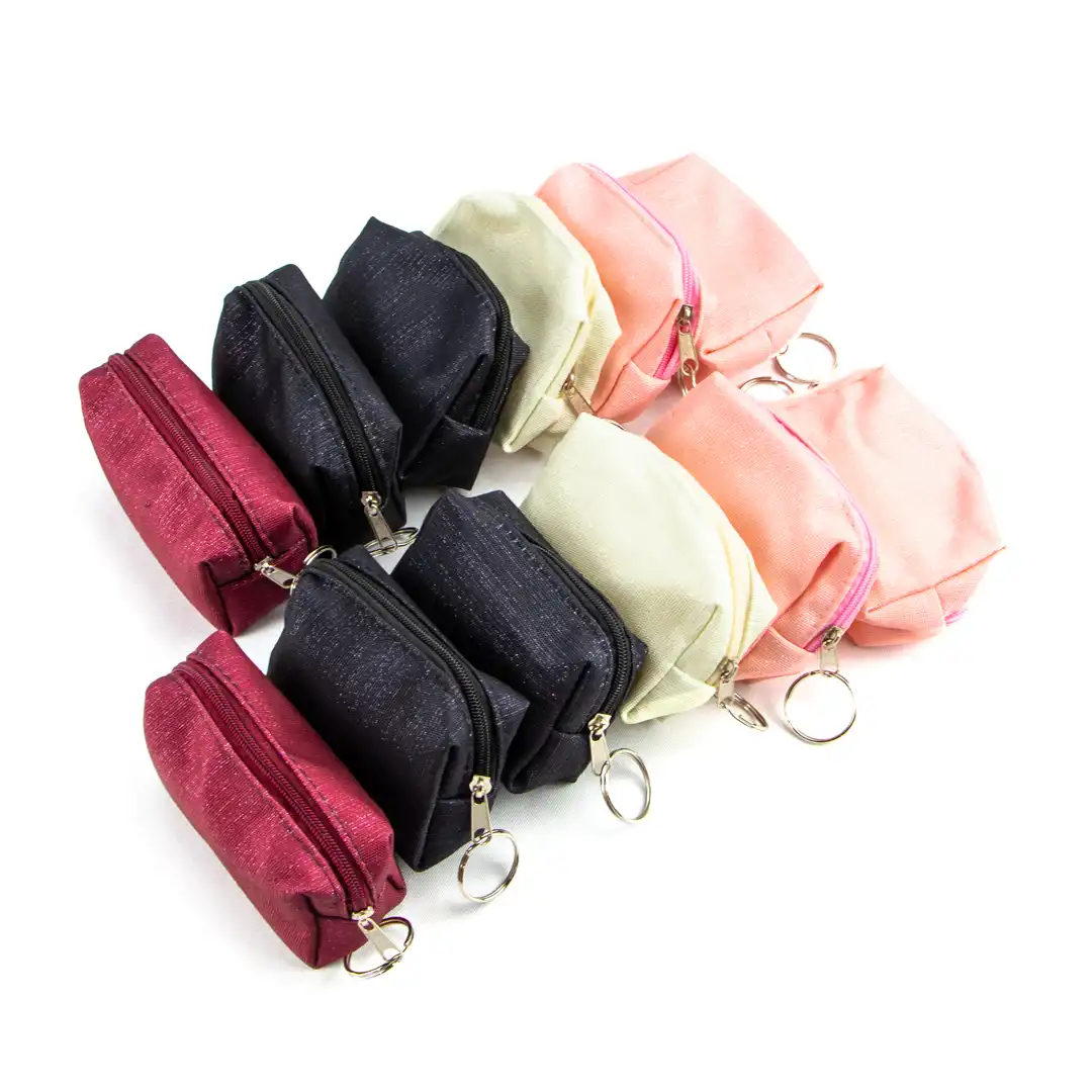 NECESSAIRE EM TECIDO COM ARGOLA