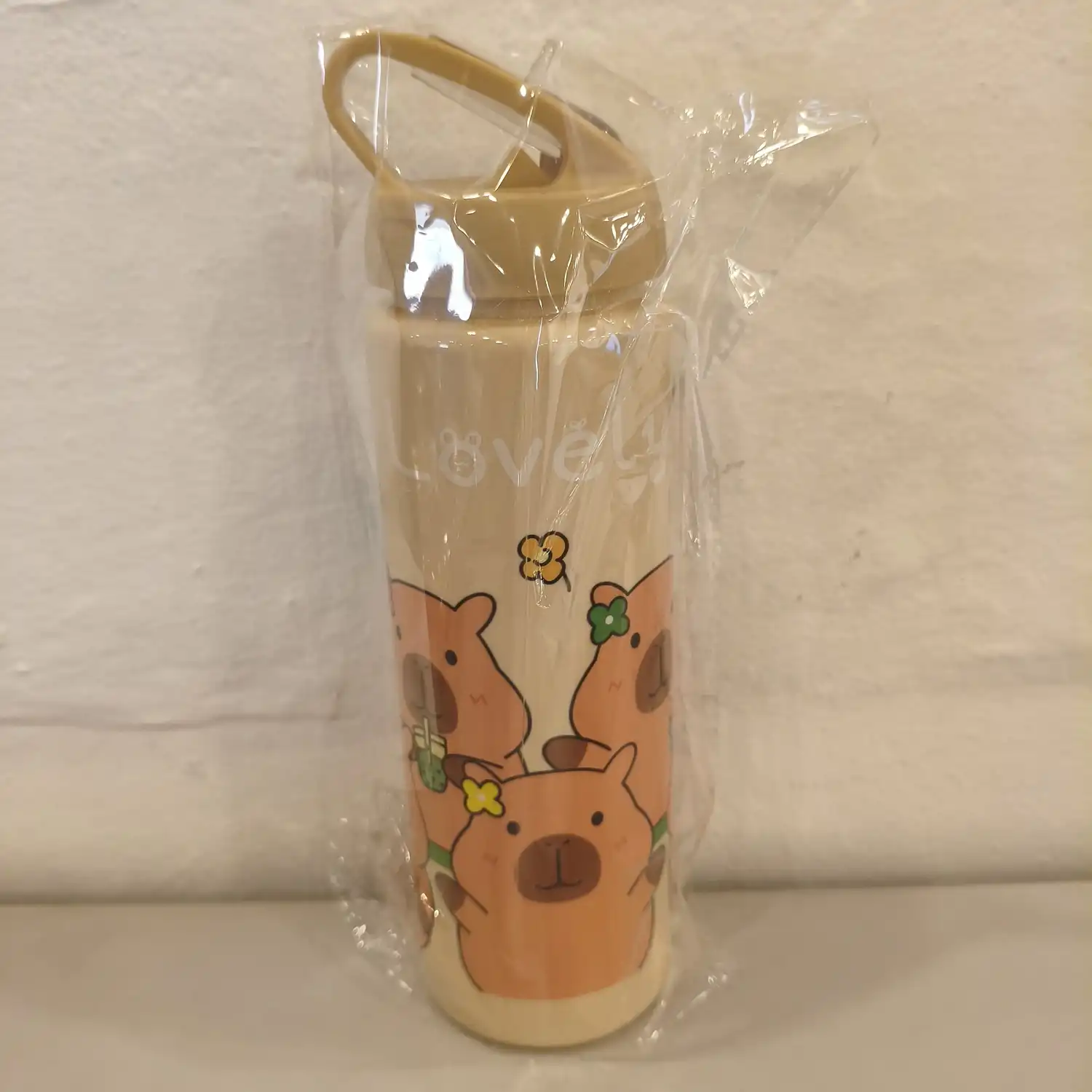 GARRAFA PLÁSTICA CAPIVARA BEGE 700ML