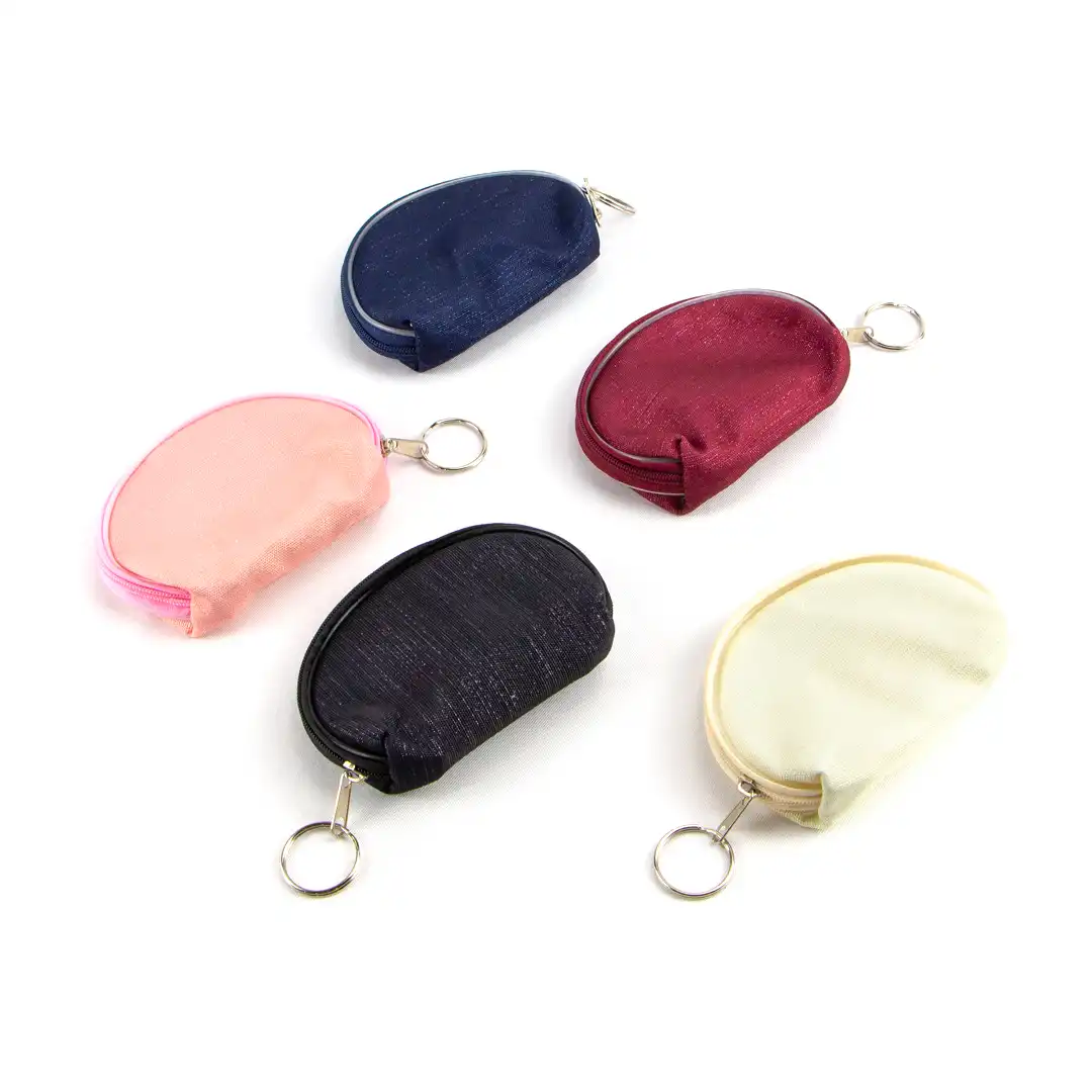 NECESSAIRE EM TECIDO COM ARGOLA